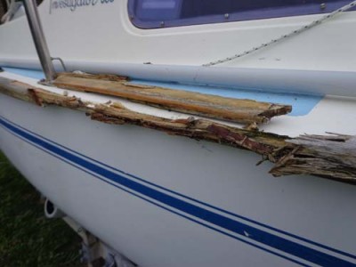 In this pic you can see the worst of the starboard gunwale, where water has sat against the inside edge and encouraged dry rot over many years. The previous owner simply painted over the rot and pretended it wasn't there. I tried to cut it out and fill with plastic wood bog; that worked for a few seasons, then eventually fell out.