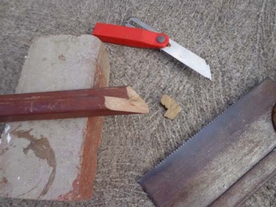 Using an adjustable square to measure and then mark up bow end angles, ready for sawing with bench saw.