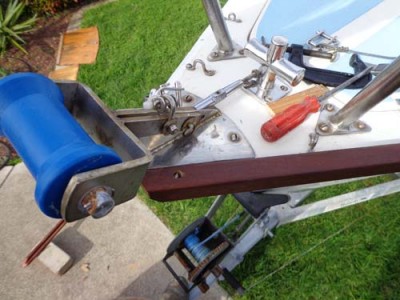 First bow bolt fitted. Note cut angle of wood against the bow plate.