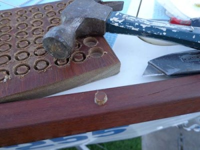 New plug fitted, tapped into place with hammer, and smeared around its body with a little epoxy glue.