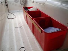 Slide out storage buckets.  They are joined along the side with a timber strip. Normally located under the cockpit sole, and slide out under the step. One on each side.