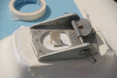 Cast mast step showing masking tape around to catch any oozing silicone