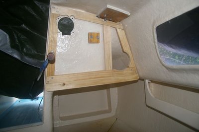 Port frame in place for early measurement (held with G-clamp); note that I plan to insert a 90mm diameter x 500mm long PVC tube down the side for storing charts, etc