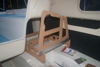 Port side frame, with large cut-out area for read of compass housing. Note also black front liner on rear cabin wall, and the extension to the berth in rear end (to extend that port berth to 6'6&quot;).