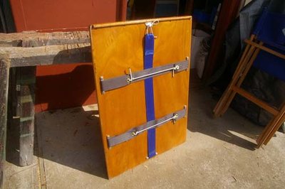 Forward hatch showing webbing, nylon hooks and shock cord arrangement.
