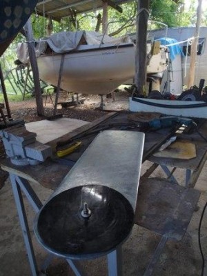 black packer pads around the pivot pin. Used 2mm ?polyethylene - (cutting board plastic) , made 270 mm diameter circles. Ended up using 3 pads for a snug fit with little side movement in the center case.