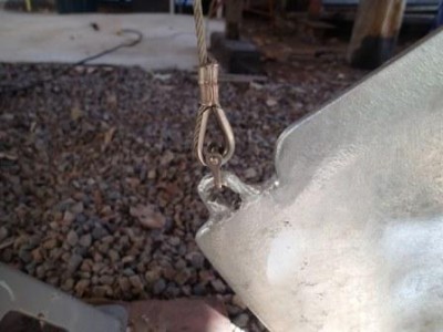 Swaged a hard eye to the end of the lift wire. Used a slotted pin shackle to attach it to center board so future maintenance is easier.